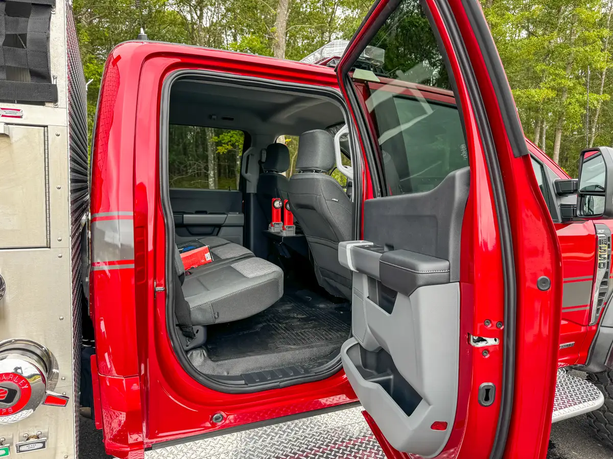 Rear cabin interior view showing seat layout and legroom behind front seats.